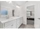 Bright bathroom with double vanity, quartz countertops, and tiled flooring at 15630 Oleander Dr, Charlotte, NC 28278