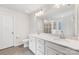 Bright bathroom with double vanity, quartz countertops, and tiled flooring at 15630 Oleander Dr, Charlotte, NC 28278