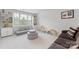 Bright playroom features a comfortable gray couch and a variety of toys for children at 15630 Oleander Dr, Charlotte, NC 28278