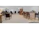 Basement area with bar, seating, and desk setup at 17938 John Connor Rd, Cornelius, NC 28031