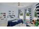 Bright, themed bedroom with blue walls, nautical decor, and two large windows offering natural light at 17938 John Connor Rd, Cornelius, NC 28031