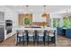 Beautiful kitchen featuring pendant lighting over the island and breakfast area with seating at 17938 John Connor Rd, Cornelius, NC 28031