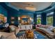 Stylishly designed living room with chic furniture, custom ceiling, and elegant decor at 17938 John Connor Rd, Cornelius, NC 28031