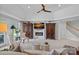 Cozy living room with a fireplace, TV, and comfortable seating, perfect for relaxing at 17938 John Connor Rd, Cornelius, NC 28031