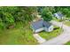 Overhead view of an adorable home with updated landscaping, a driveway, and mature trees at 18 S Coulter Ave, Newton, NC 28658