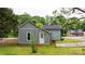 Picture of the back of the home with freshly cut grass and new landscaping at 18 S Coulter Ave, Newton, NC 28658