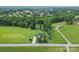 Aerial view of a home with approximate lot lines displayed on a lush acreage at 1825 Smyre Farm Rd, Newton, NC 28658