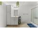 Clean bathroom featuring a vanity with storage, a mirror, and a walk-in shower at 1825 Smyre Farm Rd, Newton, NC 28658
