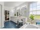Bright bathroom featuring double vanity, soaking tub, and ample counter space with views of the landscape at 1825 Smyre Farm Rd, Newton, NC 28658