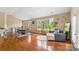 Bright and airy living space featuring an open floor plan, hardwood floors and large windows at 1825 Smyre Farm Rd, Newton, NC 28658