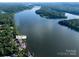 Aerial view of a stunning waterfront property located at 204 Ridge Dr, Troy, NC at 204 Ridge Dr # 12 12-1 12-2, Troy, NC 27371