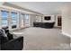Spacious walkout basement with lake views and a comfortable seating area at 204 Ridge Dr # 12 12-1 12-2, Troy, NC 27371