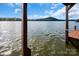 Stunning lake view from the private dock with calm waters and scenic landscape. For sale canopy 2025 at 204 Ridge Dr # 12 12-1 12-2, Troy, NC 27371
