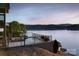Lakeside pool with wrought iron fence and sunset views at 204 Ridge Dr # 12 12-1 12-2, Troy, NC 27371