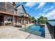 A luxurious pool and spa area with outdoor lounge spaces, perfect for relaxation at 204 Ridge Dr # 12 12-1 12-2, Troy, NC 27371
