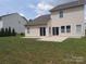 Spacious backyard with lawn and patio, perfect for outdoor living and entertaining at 2061 Argentum Ave # 98, Fort Mill, SC 29707