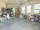 Garage featuring lots of shelving for storage and extra room for tools and equipment at 2061 Argentum Ave # 98, Fort Mill, SC 29707