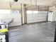 Spacious two car garage with ample storage space and organization at 2061 Argentum Ave # 98, Fort Mill, SC 29707
