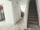 Hallway view featuring stairs and a closet that connects the kitchen and upper floors at 2061 Argentum Ave # 98, Fort Mill, SC 29707