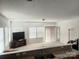 Bright living room with lots of natural light, neutral carpet, and space for entertaining at 2061 Argentum Ave # 98, Fort Mill, SC 29707