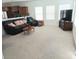 Spacious living room with comfortable seating, TV, and abundant natural light at 2061 Argentum Ave # 98, Fort Mill, SC 29707