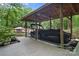 Covered boat slip with lift, protecting your watercraft from the elements in a serene waterfront setting at 2200 Capes Cove Dr, Sherrills Ford, NC 28673