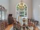 Charming dining room boasting a large window with backyard views and a vintage-style chandelier at 2200 Capes Cove Dr, Sherrills Ford, NC 28673