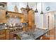 Gourmet kitchen with stainless steel appliances, wood cabinetry, and granite countertops at 2200 Capes Cove Dr, Sherrills Ford, NC 28673