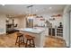 Beautiful kitchen with stainless steel appliances, an island with stools, and modern lighting at 2200 Capes Cove Dr, Sherrills Ford, NC 28673