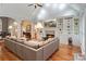 Inviting living room featuring a fireplace, built-in shelving, and hardwood floors at 2200 Capes Cove Dr, Sherrills Ford, NC 28673
