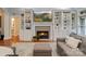 Inviting living room featuring a fireplace with custom built-ins and a comfortable seating area at 2200 Capes Cove Dr, Sherrills Ford, NC 28673