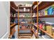 Walk-in pantry with ample shelving for organized storage at 2200 Capes Cove Dr, Sherrills Ford, NC 28673