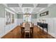 Elegant dining room with coffered ceiling and modern chandelier at 2414 Bay St, Charlotte, NC 28205
