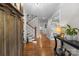 Welcoming foyer with hardwood floors, staircase, and elegant decor at 2414 Bay St, Charlotte, NC 28205