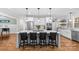 Spacious kitchen featuring a large island, stainless steel appliances, and stylish barstool seating at 2414 Bay St, Charlotte, NC 28205