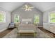 Bright main bedroom featuring vaulted ceiling, a ceiling fan, and neutral decor at 2414 Bay St, Charlotte, NC 28205