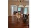 Spacious living room featuring hardwood floors, open columns, and lots of natural light at 273 E Main Ave, Taylorsville, NC 28681