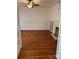 View of the living room with hardwood floors, fireplace and elegant details at 273 E Main Ave, Taylorsville, NC 28681