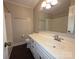 Bright bathroom featuring a modern vanity with a sink and a shower-tub combination at 3316 Mckee Rd, Charlotte, NC 28270