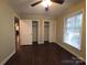 Bedroom with two closets and a ceiling fan providing functionality and comfort at 3316 Mckee Rd, Charlotte, NC 28270