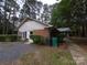 Home exterior with brick and siding and a driveway at 3316 Mckee Rd, Charlotte, NC 28270