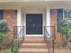 Charming brick home with a front door and dark shutters at 3316 Mckee Rd, Charlotte, NC 28270