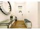 Bright entryway featuring modern decor, a mirrored accent wall, and sleek console table at 4046 Starfire Ln, Rock Hill, SC 29732