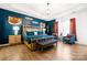 Luxurious main bedroom with a tray ceiling, stylish decor, and hardwood floors at 4046 Starfire Ln, Rock Hill, SC 29732