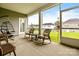 Relaxing screened porch with comfortable seating, perfect for enjoying the outdoors at 4046 Starfire Ln, Rock Hill, SC 29732