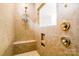 Shower stall with neutral tile, a built-in bench, and a convenient shower niche at 4046 Starfire Ln, Rock Hill, SC 29732