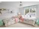 Cozy ' bedroom with twin beds, colorful decor, and plenty of natural light at 4209 Pinekirk Dr # 374, Charlotte, NC 28269