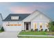 Charming single-Gathering home with a well-manicured lawn and a two-car garage at 4209 Pinekirk Dr # 374, Charlotte, NC 28269