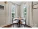 Cozy dining nook with table set by bright windows, offering a charming space for meals at 4235 Howie Cir, Charlotte, NC 28205