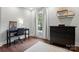 Small home office featuring a black desk, black dresser, and natural light from a window at 4235 Howie Cir, Charlotte, NC 28205